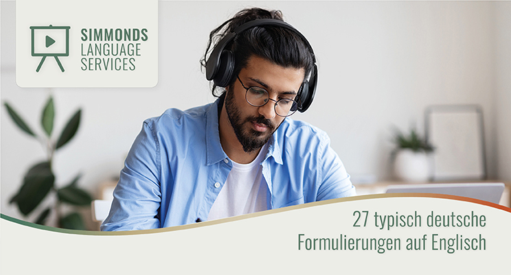 Mann mit Kopfhörer beim Online Englisch lernen